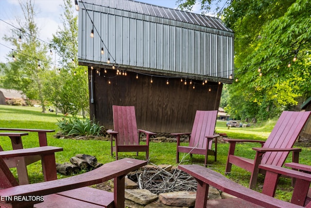 3509 Ginseng Way, Sevierville, TN 37862 - wooden terrace with an outdoor fire pit and a yard