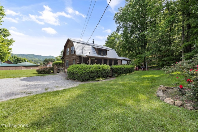3509 Ginseng Way, Sevierville, TN 37862 - back of property featuring a gambrel roof, metal roof, a lawn, log exterior, and a mountain view