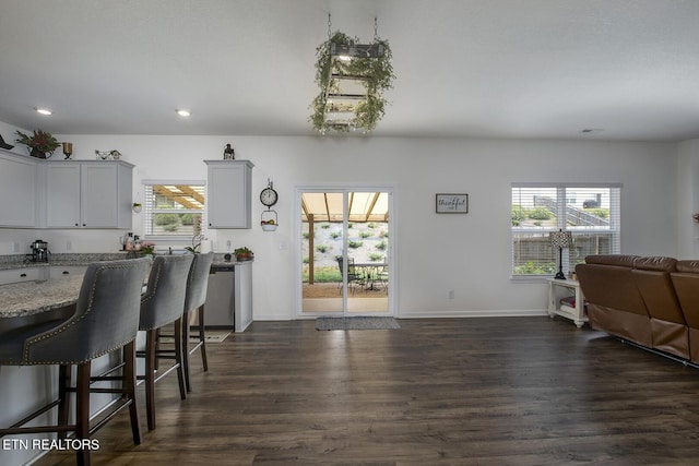 12017 Spearmint Ln, Knoxville, TN 37932 - dining space featuring dark wood-style flooring, recessed lighting, and baseboards