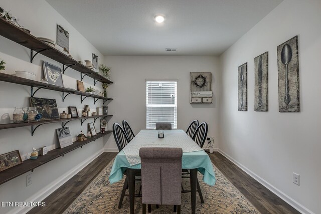 12017 Spearmint Ln, Knoxville, TN 37932 - dining area featuring dark wood finished floors and baseboards
