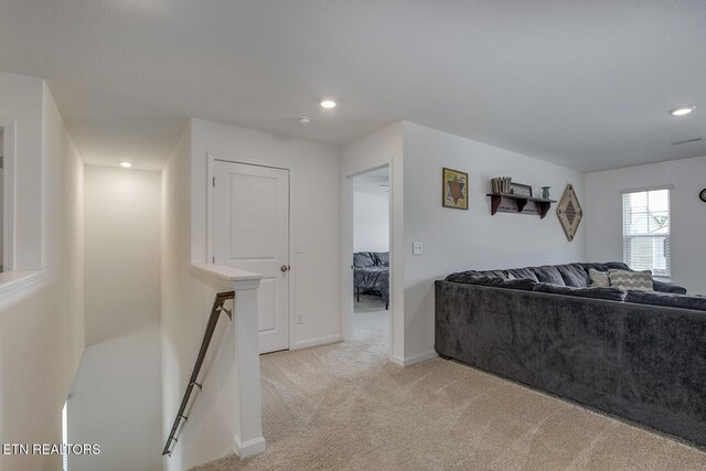 12017 Spearmint Ln, Knoxville, TN 37932 - living room featuring light colored carpet, recessed lighting, and baseboards
