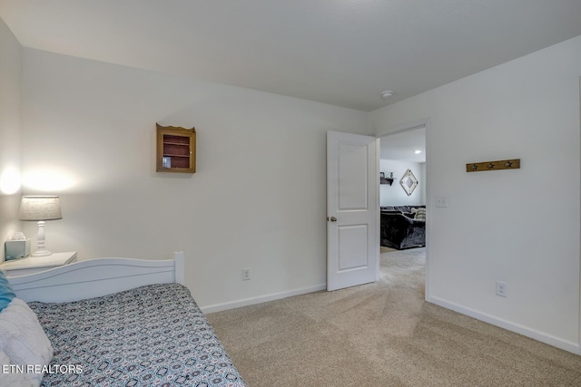 12017 Spearmint Ln, Knoxville, TN 37932 - bedroom with light carpet and baseboards