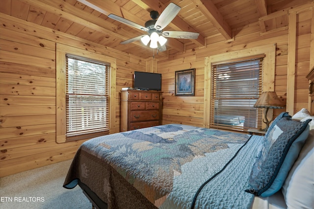 2405 Autumn Valley Way, Pigeon Forge, TN 37862 - carpeted bedroom featuring wood ceiling with exposed beams, wood walls, and ceiling fan