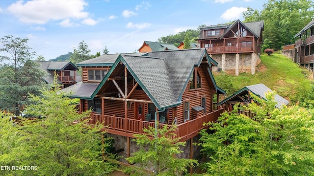 2405 Autumn Valley Way, Pigeon Forge, TN 37862 - back of property featuring roof with shingles and a deck
