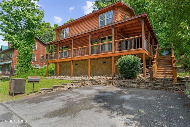 2377 Alpine Village Way, Pigeon Forge, TN 37862 - rear view of property featuring a deck, stairs, and a patio