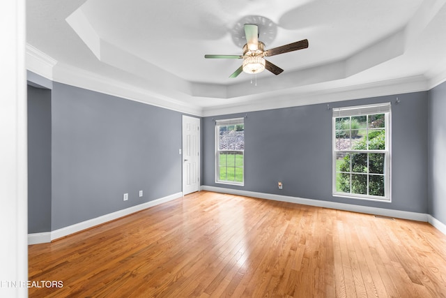 128 Harbour View Way, Kingston, TN 37763 - unfurnished room with a tray ceiling, hardwood / wood-style flooring, baseboards, a ceiling fan, and crown molding