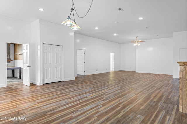 128 Harbour View Way, Kingston, TN 37763 - unfurnished living room featuring ceiling fan, ornamental molding, wood finished floors, recessed lighting, and baseboards