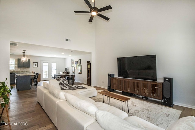 3250 Truitt Path Ln, Knoxville, TN 37931 - living room featuring ceiling fan, wood finished floors, and baseboards