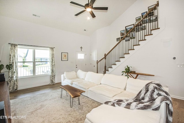 3250 Truitt Path Ln, Knoxville, TN 37931 - living area with stairway, wood finished floors, a ceiling fan, baseboards, and high vaulted ceiling