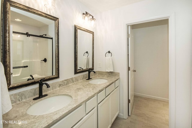3250 Truitt Path Ln, Knoxville, TN 37931 - full bath with double vanity, a shower, and baseboards
