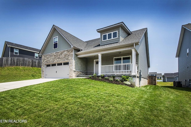 3250 Truitt Path Ln, Knoxville, TN 37931 - craftsman inspired home with covered porch, roof with shingles, a garage, concrete driveway, and cooling unit