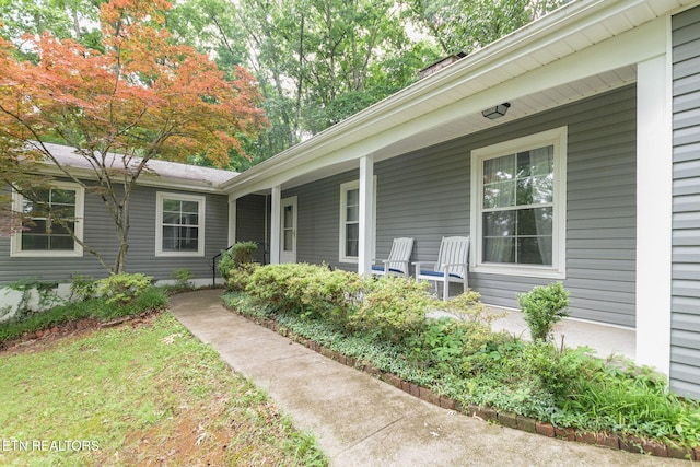 106 Morgan Rd, Oak Ridge, TN 37830 - view of exterior entry with a porch
