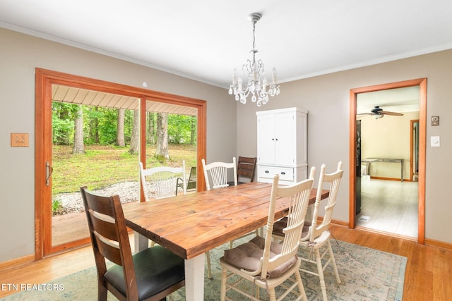 106 Morgan Rd, Oak Ridge, TN 37830 - dining space featuring ornamental molding, light wood-style floors, a chandelier, baseboards, and ceiling fan