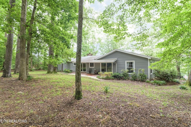 106 Morgan Rd, Oak Ridge, TN 37830 - rear view of house featuring a chimney
