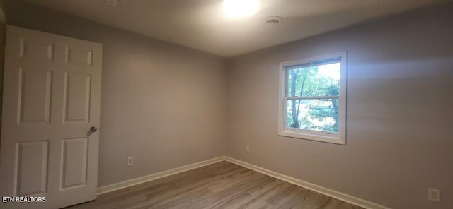 1304 Holyoke St, Kingsport, TN 37664 - unfurnished room featuring wood finished floors and baseboards