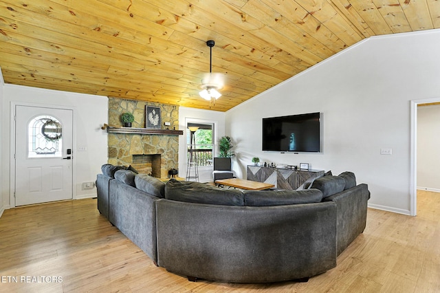 3050 Patty View Way, Sevierville, TN 37862 - living area with wooden ceiling, vaulted ceiling, light wood-style floors, baseboards, and a fireplace