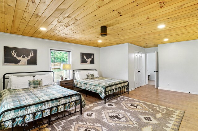 3050 Patty View Way, Sevierville, TN 37862 - bedroom featuring wood ceiling, recessed lighting, wood finished floors, ornamental molding, and baseboards