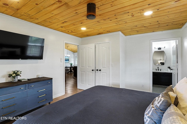 3050 Patty View Way, Sevierville, TN 37862 - bedroom with wooden ceiling, light wood-style flooring, a sink, ensuite bath, and a closet