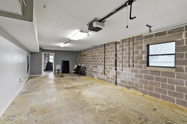 3050 Patty View Way, Sevierville, TN 37862 - garage with baseboards and a garage door opener