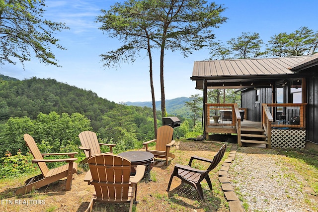3050 Patty View Way, Sevierville, TN 37862 - view of yard with a fire pit, a deck with mountain view, and a forest view