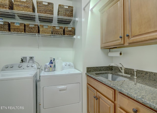 192 Saloli Way, Loudon, TN 37774 - laundry room featuring washing machine and dryer and cabinet space