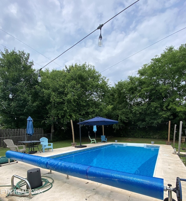 106 Apache Rd, Maryville, TN 37804 - view of swimming pool with a patio and view of wooded area