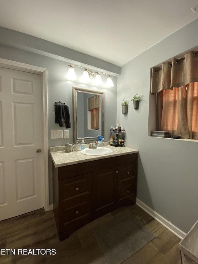 106 Apache Rd, Maryville, TN 37804 - bathroom featuring vanity, wood finished floors, and baseboards