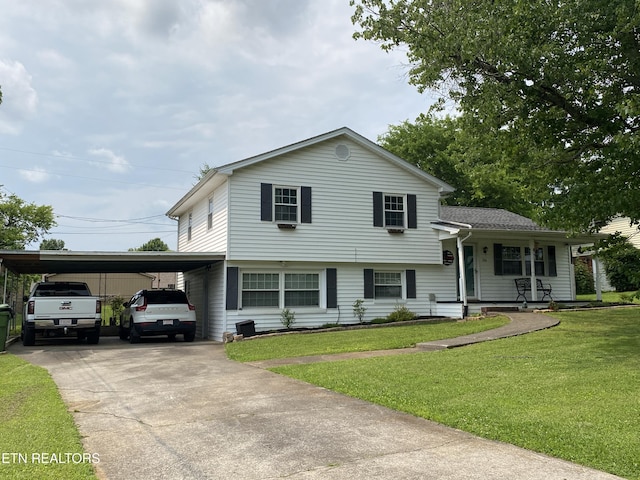106 Apache Rd, Maryville, TN 37804 - view of front of house with driveway, a front yard, and a carport