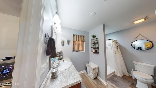 106 Apache Rd, Maryville, TN 37804 - bathroom with vanity, wood finished floors, toilet, a shower with curtain, and baseboards