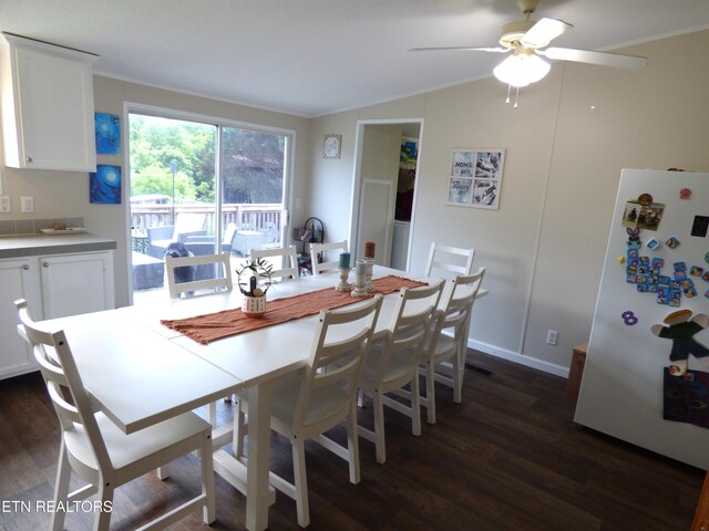 395 E Dumplin Valley Rd, Jefferson City, TN 37760 - dining space featuring dark wood finished floors, ceiling fan, vaulted ceiling, and baseboards