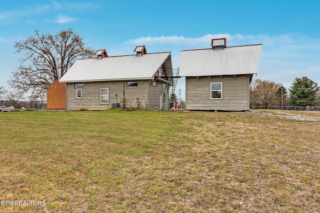 4949 S York Hwy, Jamestown, TN 38556 - back of house with metal roof and central AC unit
