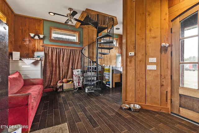 4949 S York Hwy, Jamestown, TN 38556 - living room with stairway, wood walls, a ceiling fan, and wood finished floors