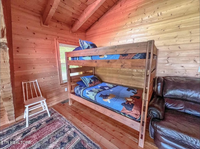2438 Walnut Ridge Way, Sevierville, TN 37862 - bedroom featuring wooden walls, wooden ceiling, and wood-type flooring