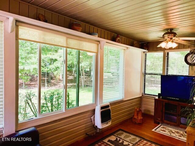 15 Felix Ct, Crossville, TN 38558 - sunroom with healthy amount of natural light and heating unit