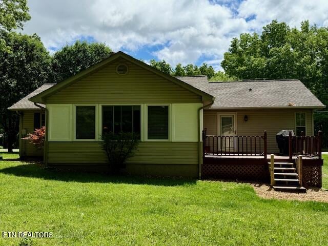 15 Felix Ct, Crossville, TN 38558 - back of house with a deck and a yard