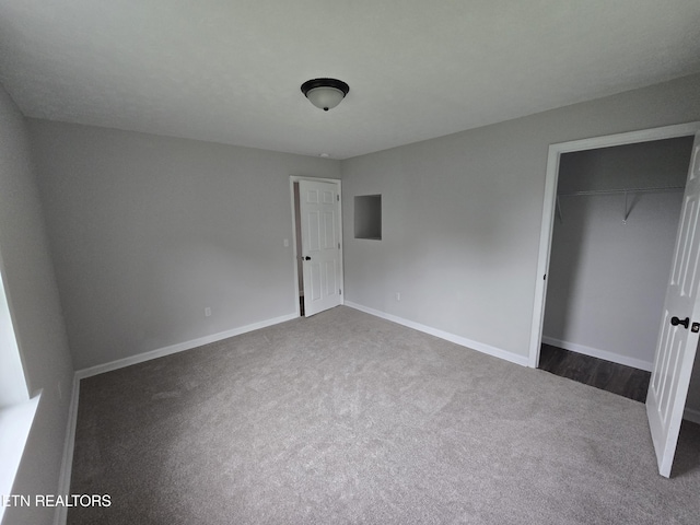 550 N 13th St, Lafollette, TN 37766 - unfurnished bedroom featuring carpet floors, a closet, and baseboards