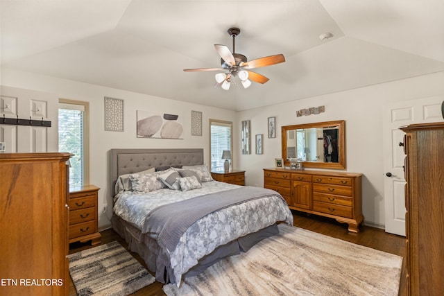 407 Tecumseh Pt, Loudon, TN 37774 - bedroom with dark wood-style floors, lofted ceiling, and ceiling fan