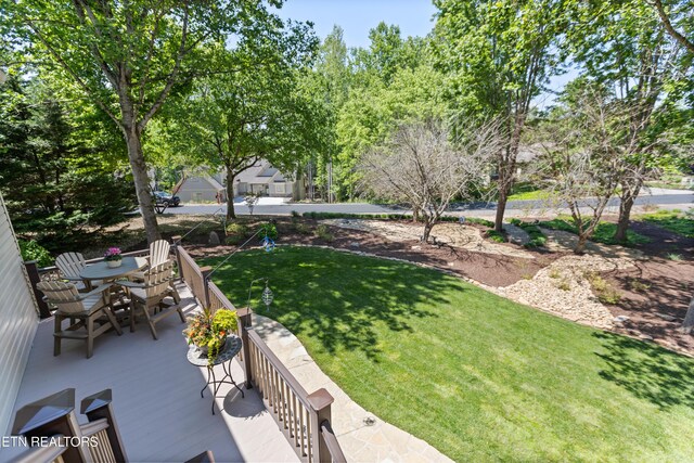 407 Tecumseh Pt, Loudon, TN 37774 - view of green lawn with outdoor dining area