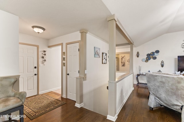 407 Tecumseh Pt, Loudon, TN 37774 - foyer entrance with dark wood finished floors, baseboards, and vaulted ceiling