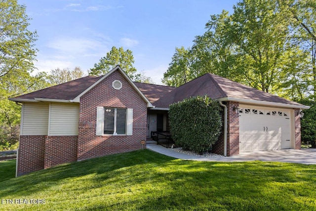 407 Tecumseh Pt, Loudon, TN 37774 - ranch-style home featuring brick siding, an attached garage, concrete driveway, and a front yard