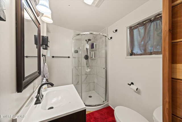 938 Riley Creek Rd, Whitleyville, TN 38588 - full bath featuring toilet, vanity, and a shower stall