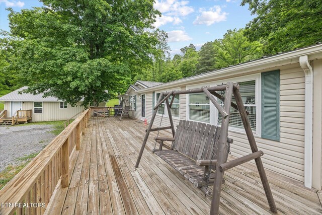 938 Riley Creek Rd, Whitleyville, TN 38588 - deck featuring outdoor dining area