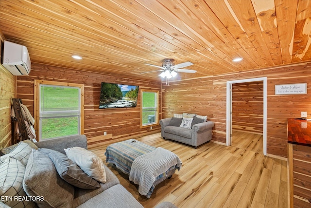 938 Riley Creek Rd, Whitleyville, TN 38588 - living area featuring wooden ceiling, a wall unit AC, wooden walls, wood-type flooring, and healthy amount of natural light