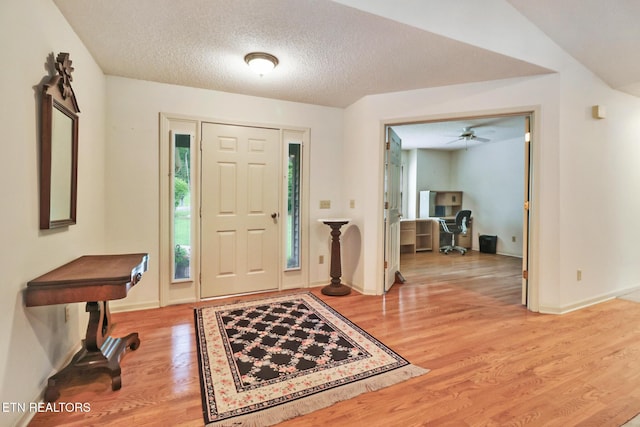 45 Calderwood Cir, Fairfield Glade, TN 38558 - foyer entrance with wood finished floors, a textured ceiling, baseboards, and a ceiling fan