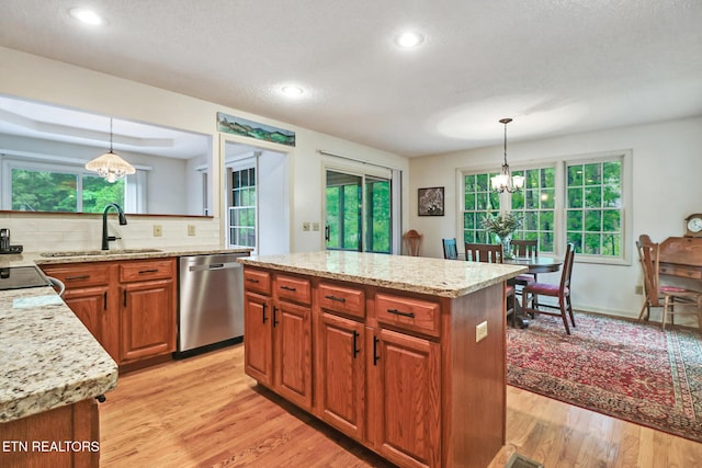 45 Calderwood Cir, Fairfield Glade, TN 38558 - kitchen with dishwasher, a sink, a chandelier, light wood-type flooring, and recessed lighting
