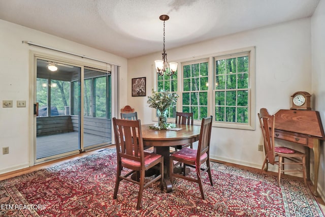 45 Calderwood Cir, Fairfield Glade, TN 38558 - dining area featuring a chandelier, baseboards, and wood finished floors