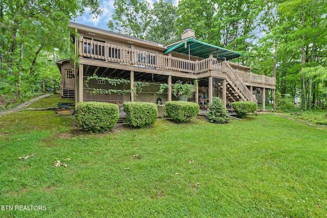 45 Calderwood Cir, Fairfield Glade, TN 38558 - rear view of property featuring stairs, a chimney, a wooden deck, and a lawn
