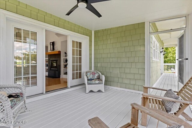 309 Southshore Dr, Greenback, TN 37742 - wooden terrace with a ceiling fan