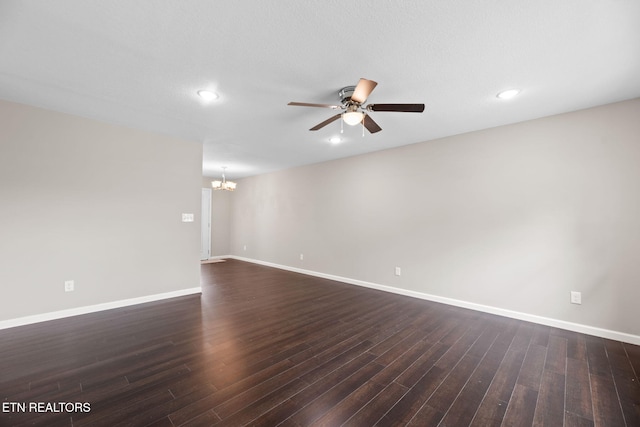 109 Ivy Ln, Oak Ridge, TN 37830 - unfurnished room featuring a chandelier, ceiling fan, dark wood-type flooring, and recessed lighting