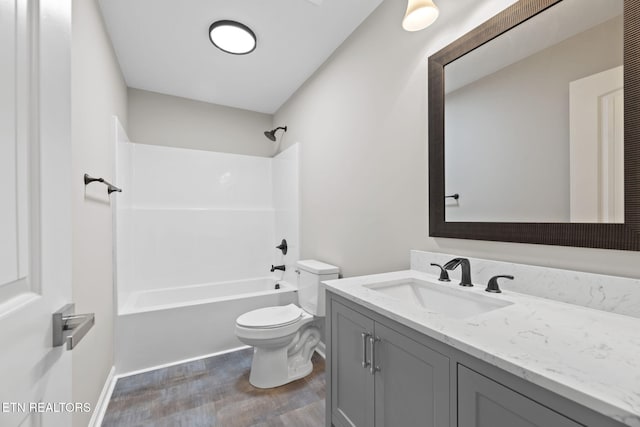 109 Ivy Ln, Oak Ridge, TN 37830 - bathroom featuring vanity, wood finished floors, and shower / tub combination